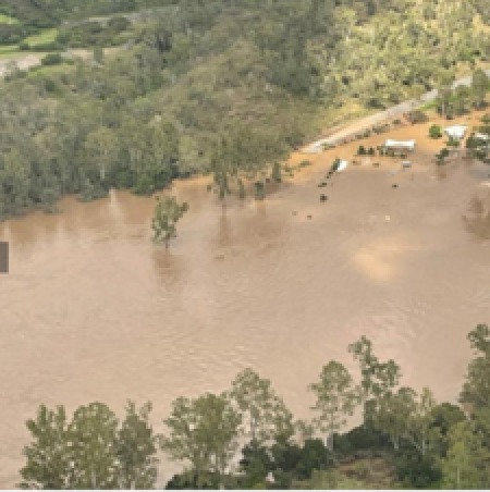 Post event drone view of road crossing 